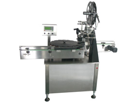 Top labeling machine